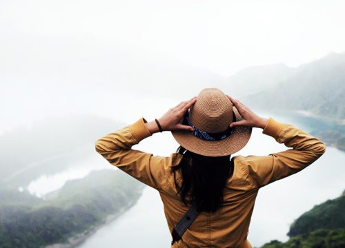 Woman overlooking a mountainous landscape