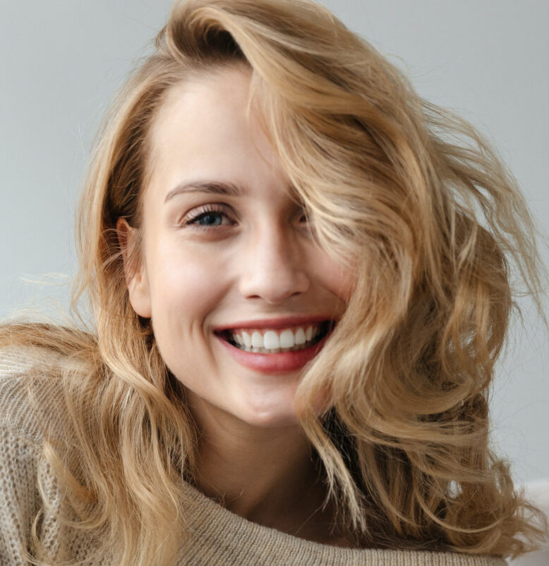 Photo of a smiling blonde woman