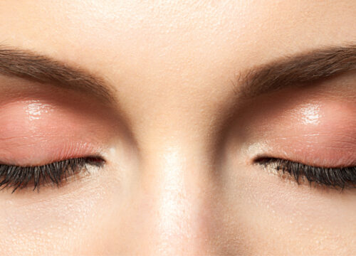 Photo of a woman's lashes and brows